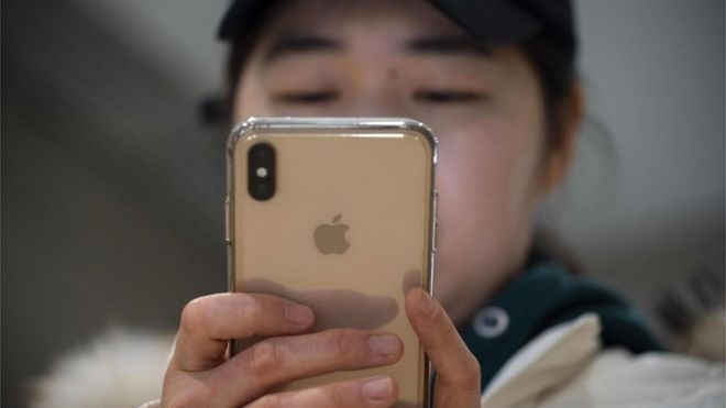 Apple blames China for sales forecast cut